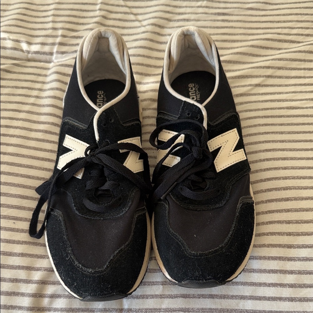 New Balance womens Black and White Lace-Up Sneakers